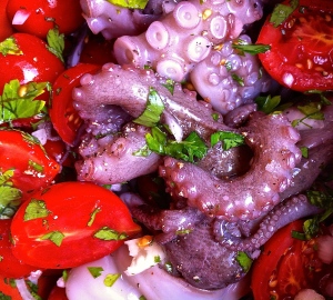 A close up photo of Polipo in Pignata before it starts to stew slowly on the stove.