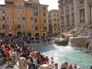Hordes of tourist visit the Trevi fountain in the heart of Rome's historic center (Photo credit: Daniel Eden).
